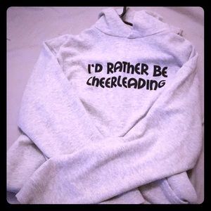 Hoodie saying I’d rather be cheerleading